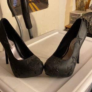 Black heels with glitter stars on it size 7 1/2